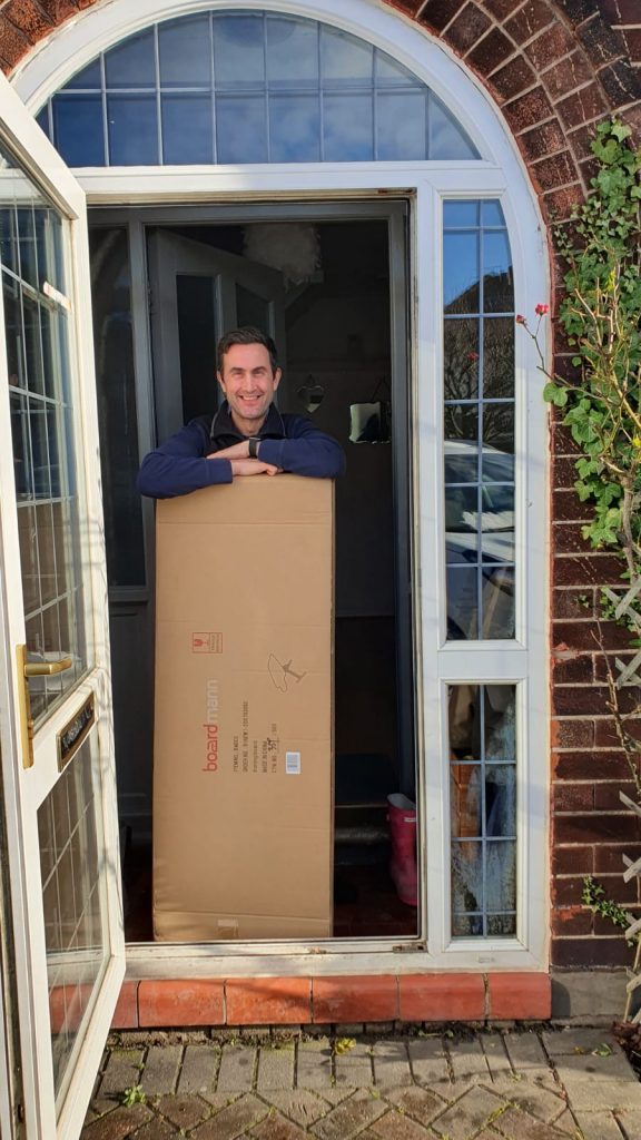 customer receiving delivery of Boardmann ironing board
